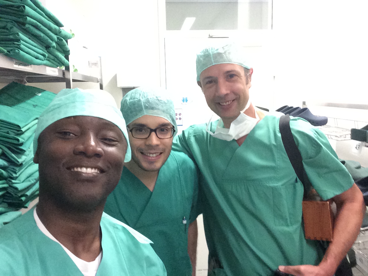 As part of FSS effort to build surgical capacity in Africa, Drs Boahene and Gassner have teamed up. Here the get ready to perform a gracilis flap to restore smile in a patient born with no smile muscles